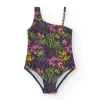 Bañador para niña en azul marino con diseño asimétrico y estampado tropical