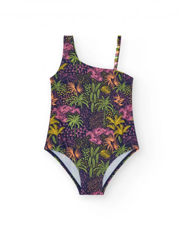 Bañador para niña en azul marino con diseño asimétrico y estampado tropical