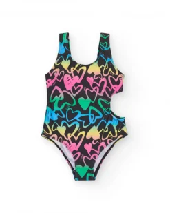 Bañador para niña en negro con corazones estampados y abertura lateral