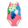 Bañador para niña en rosa con flores y tirantes cruzados