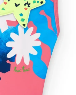 Bañador para niña en rosa con flores y tirantes cruzados