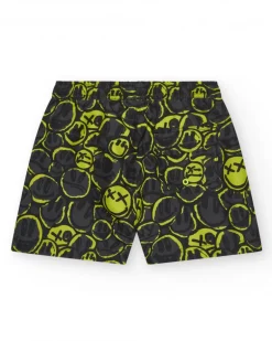 Bañador para niño en negro con estampado de emoticonos y cordón flúor.