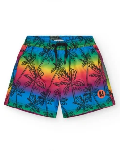 Bañador para niño multicolor con estampado de palmeras y cintura ajustable.