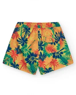 Bañador para niño multicolor con estampado tropical y cintura elástica.