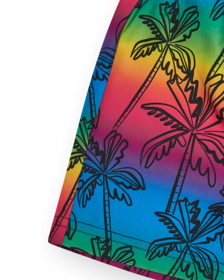 Bañador para niño multicolor con estampado de palmeras y cintura ajustable.
