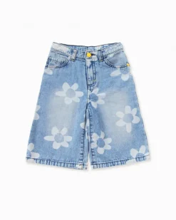 Bermuda niña en denim azul con estampado de flores