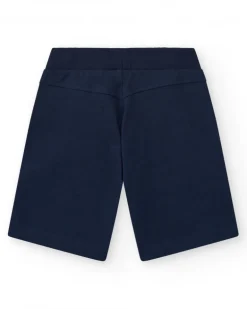 Bermuda para niño en azul marino con cintura elástica y print delantero.