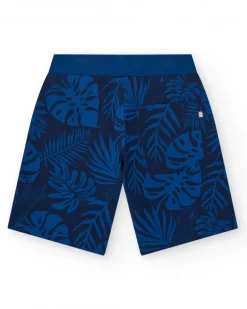 Bermuda para niño en negro con estampado tropical y cintura ajustable.