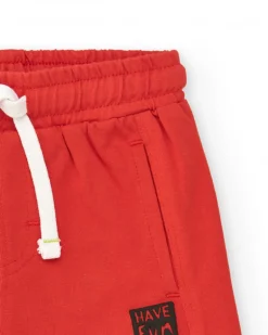 Bermuda roja para niño con bolsillos y cordón blanco