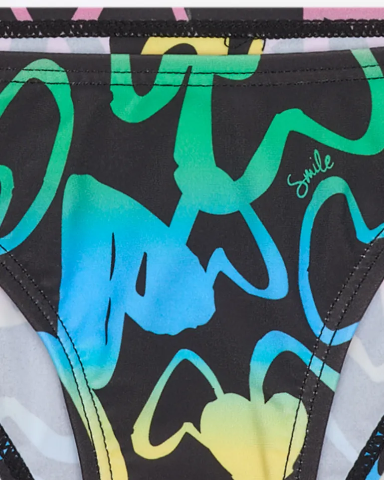 Bikini para niña en negro con corazones estampados y lazo decorativo