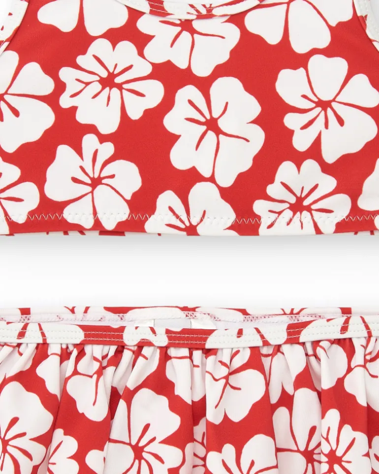 Bikini para niña en rojo con estampado floral y volante