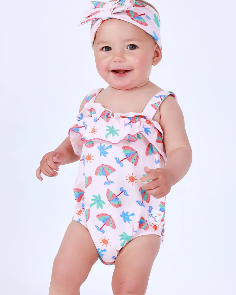 Body rosa para niña con estampado de paraguas, palmeras y soles