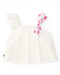 Camisa blanca para niña con lazo rosa estampado