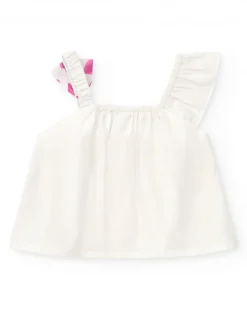 Camisa blanca para niña con lazo rosa estampado