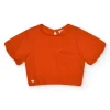Camiseta naranja para niña con flor y mangas abullonadas