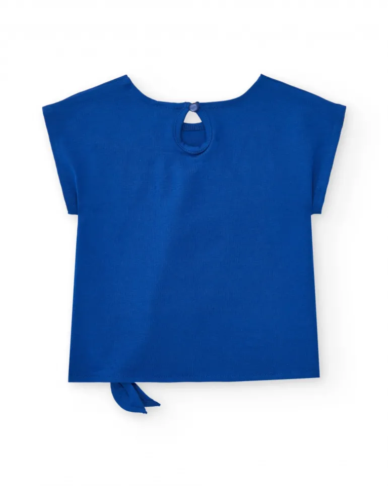 Camiseta para niña en azul con lazo lateral y botón trasero