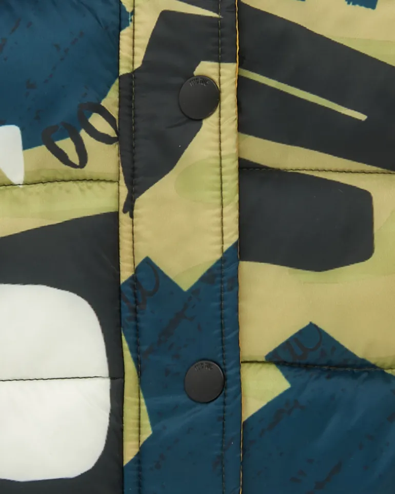 Chaleco verde acolchado para niño con estampado de dinosaurios