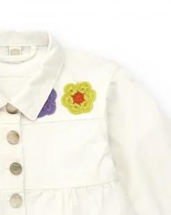 Chaqueta blanca de plana para niña con botones y volante inferior