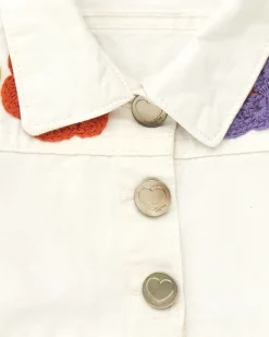 Chaqueta blanca de plana para niña con botones y volante inferior