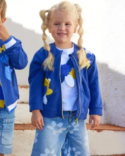 Chaqueta de felpa para niña en azul con apliques de flores y cremallera
