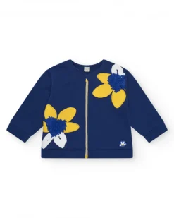 Chaqueta de felpa para niña en azul con apliques de flores y cremallera