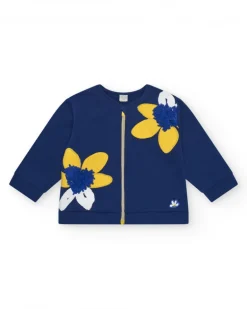 Chaqueta de felpa para niña en azul con apliques de flores y cremallera
