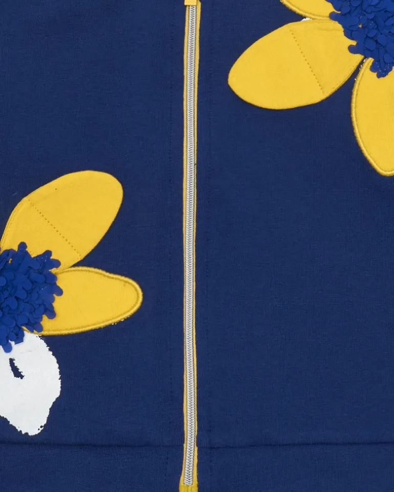 Chaqueta de felpa para niña en azul con apliques de flores y cremallera