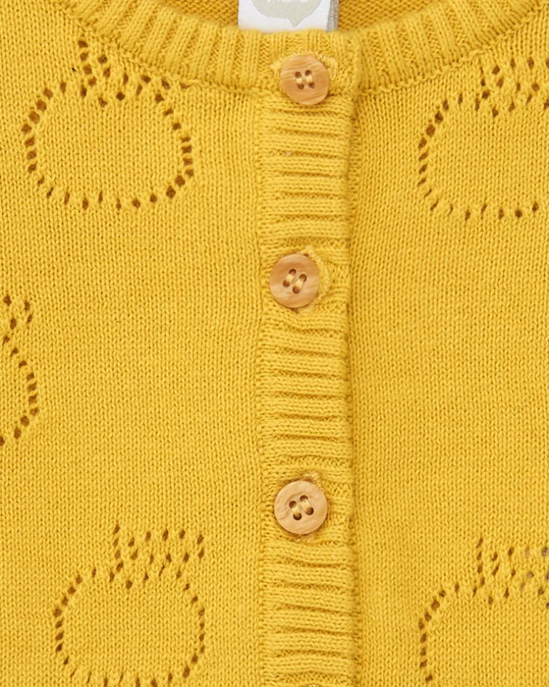 Chaqueta de tricot amarilla para niña con diseño calado de manzanas