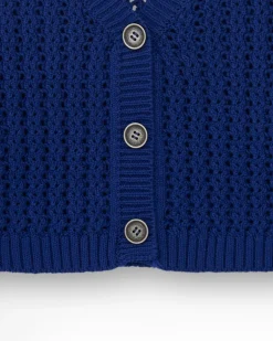 Chaqueta para niña en azul con botones decorativos