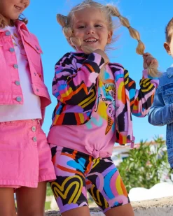 Chaqueta para niña en negro con estampado multicolor y cierre frontal