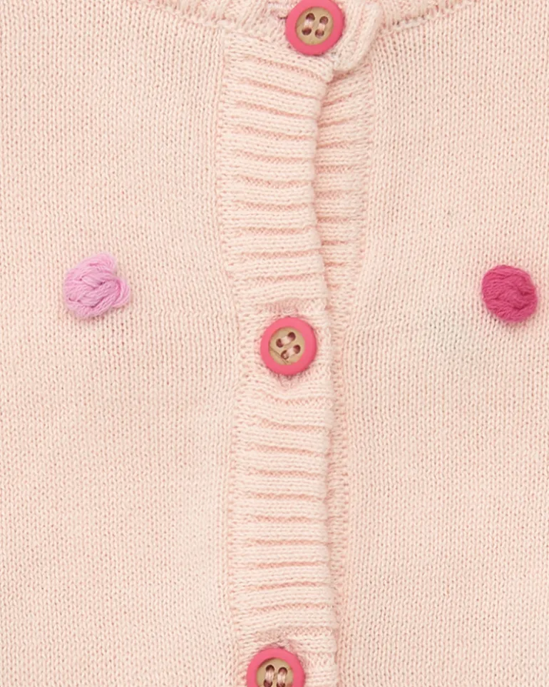 Chaqueta rosa de tricot para niña con pompones multicolor y botones frontales