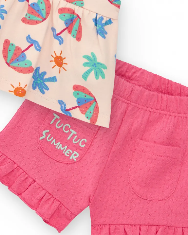 Conjunto crema para niña con blusa de paraguas y shorts rosa con volantes