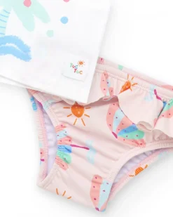 Conjunto de baño para niña con camiseta blanca de palmera y braguita rosa con volantes