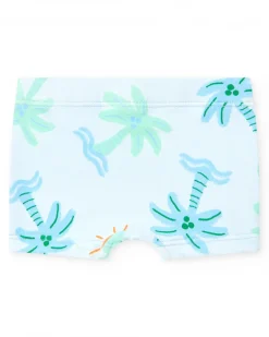 Conjunto de baño para niño con camiseta blanca de palmera y pantalón azul de estampado tropical
