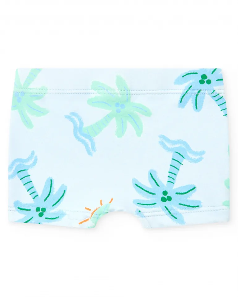 Conjunto de baño para niño con camiseta blanca de palmera y pantalón azul de estampado tropical