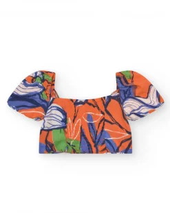 Conjunto de camisa corta y falda para niña en naranja y azul con estampado floral