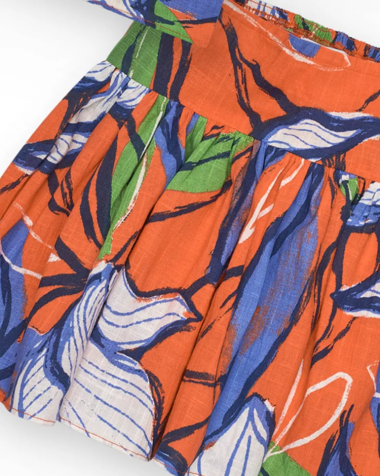 Conjunto de camisa corta y falda para niña en naranja y azul con estampado floral