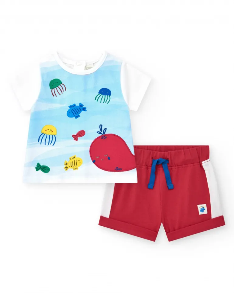 Conjunto de punto para niño con camiseta blanca y shorts rojos con detalles en blanco