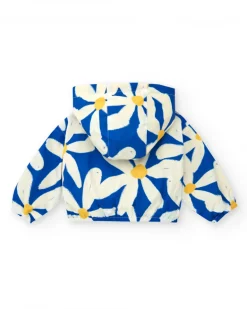 Cortavientos para niña en azul con flores y detalles amarillos