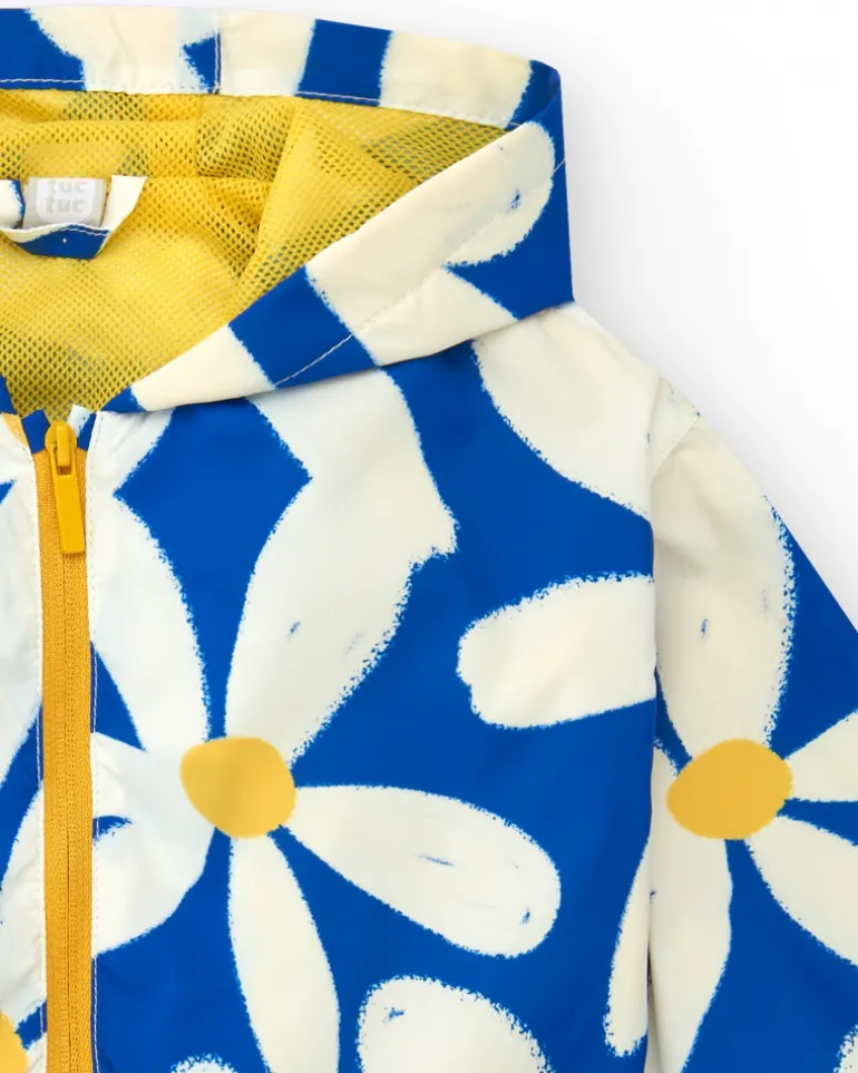 Cortavientos para niña en azul con flores y detalles amarillos