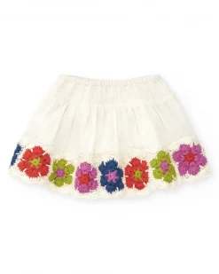 Falda blanca para niña con detalles en crochet multicolor