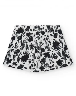 Falda para niña en blanco con estampado floral y volante