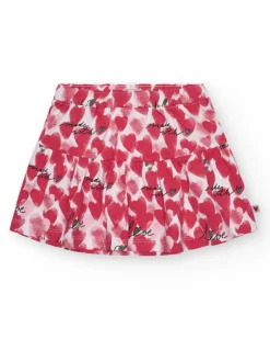 Falda para niña en rojo con corazones estampados y frases decorativas