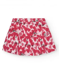 Falda para niña en rojo con corazones estampados y frases decorativas