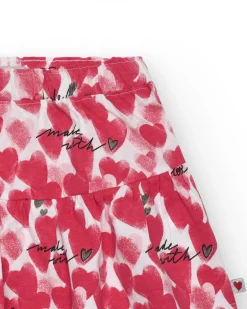 Falda para niña en rojo con corazones estampados y frases decorativas