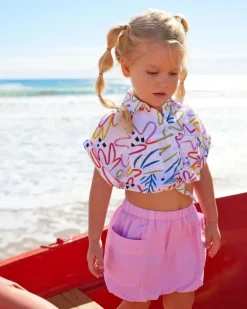 Falda para niña en rosa con bolsillos y cintura elástica