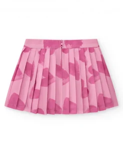 Falda plisada rosa para niña con estampado abstracto