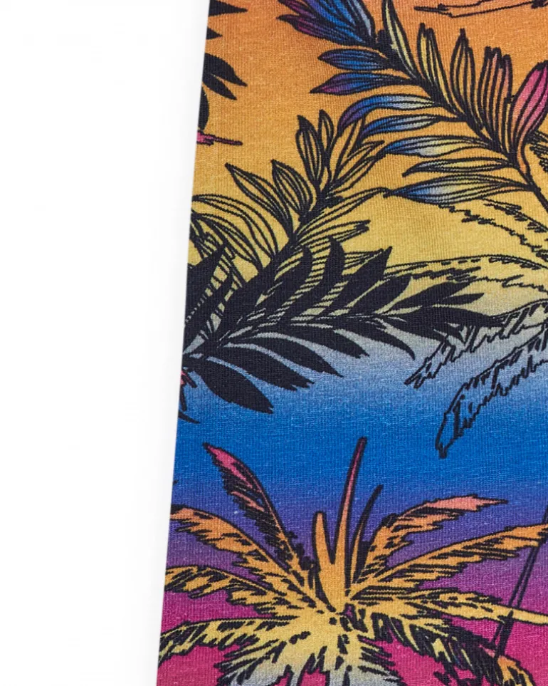 Legging ciclista para niña con estampado tropical y cintura elástica
