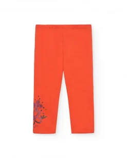 Leggings para niña en naranja con detalle floral colección Super Natural