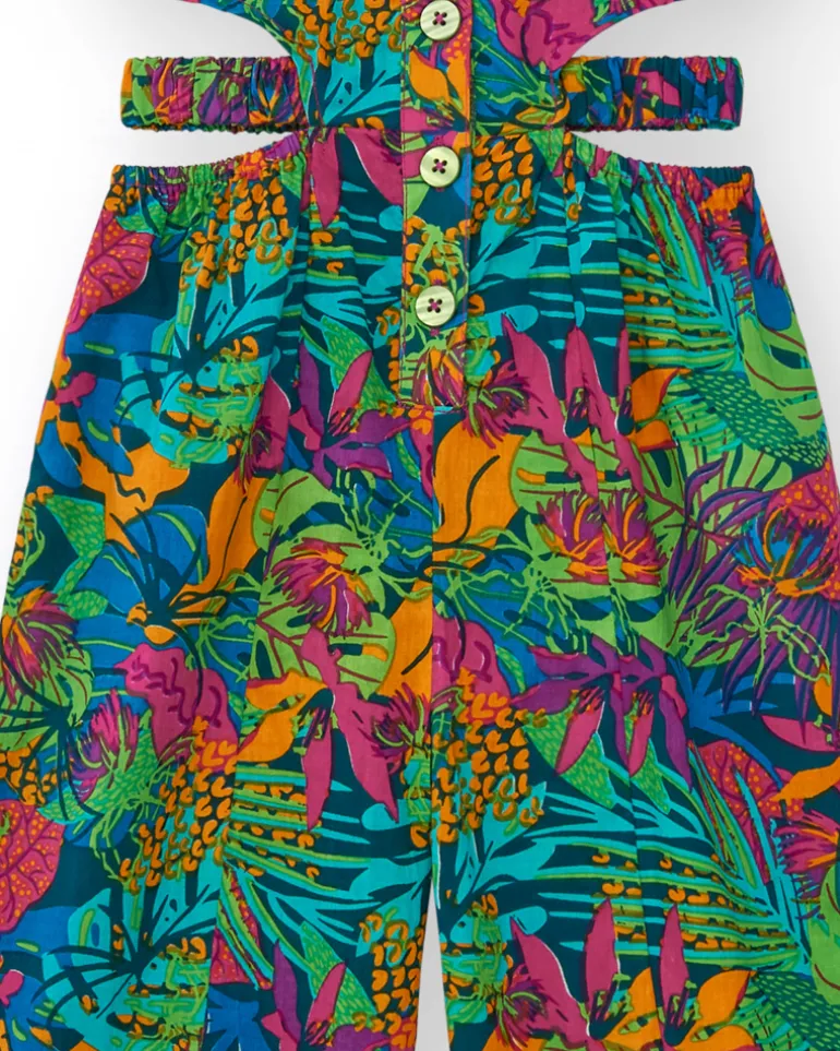 Mono para niña con estampado tropical, botones frontales y aberturas laterales